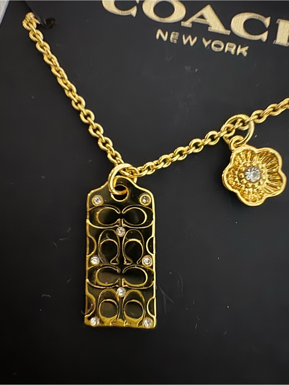 Coach Gold-Tone Logo Tag and Flower Charm Necklace - Picture 6 of 7